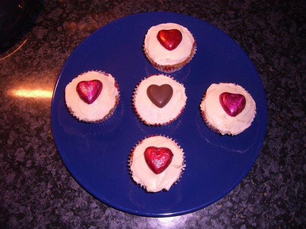 Hummingbird Bakery vanilla cupcakes with vanilla icing and heart shaped chocolates
