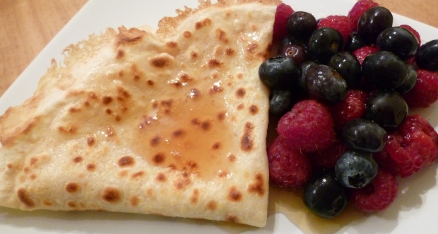 Raspberry, blueberry and maple syrup pancake